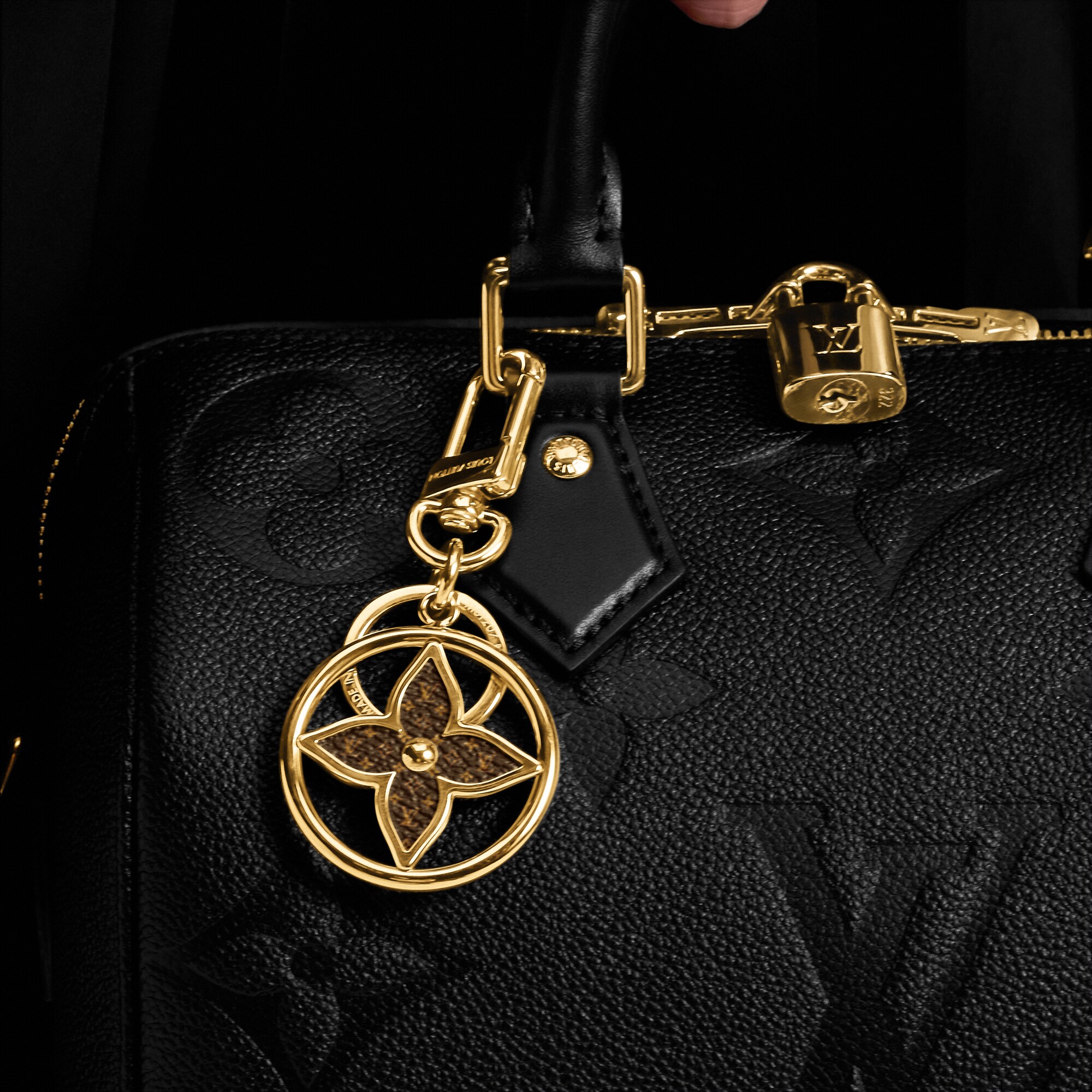 Chaveiro Puzzle Flower Monogram S00 - Acessórios | LOUIS VUITTON ®